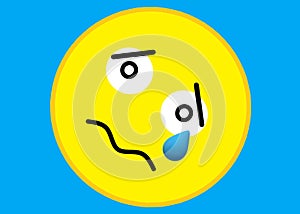 A tilted yellow smiley emoticon sad crying expression light blue turquoise backdrop