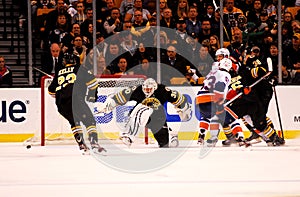 Tim Thomas makes the save.