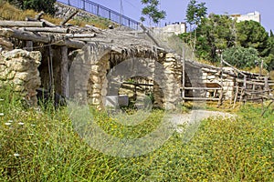 A timber built sun shade and stable in Nazareth Village Israel photo