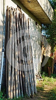 Timber formwork is prepared for pouring concrete. The metal fittings are also visible. The process of building a private house