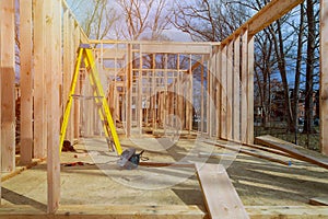 Timber frame house, new build roof with wooden home construction framing