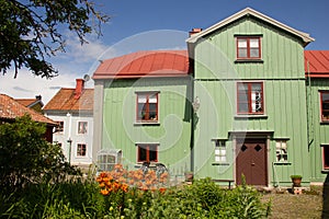 Timber green house and back garden. Vadstena. Sweden