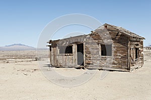 Timber home on arid landscape