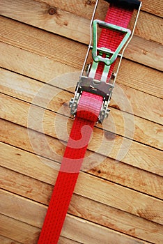 Timber with lashing strap