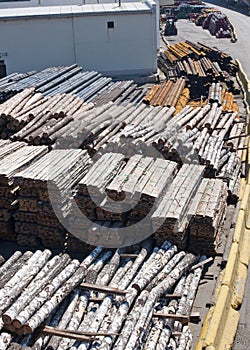 Timber and other raw materials on the dockside at Odessa