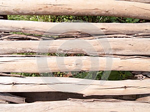Timber wall in the ground On a natural background