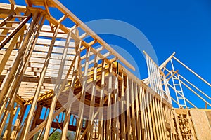 Timber wood stick frames framing beams during construction of a new home