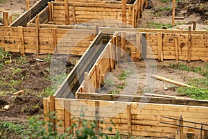 Timbering ground work for new foundation photo