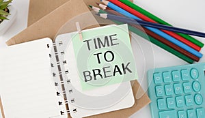 Time for a Break Text written on notebook page