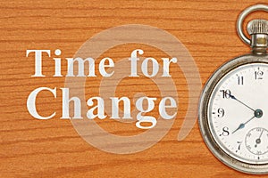 Time for change message with antique pocket watch