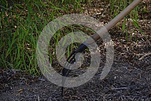 The rake gardening piece to clean the crop land photo