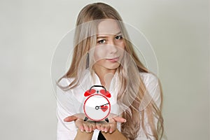 Time concept. beautiful deushka is holding