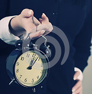 Time concept. Business woman clock