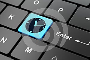 Time concept: Clock on computer keyboard background