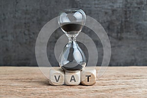 Time countdown for VAT increase deadline concept, hourglass or s