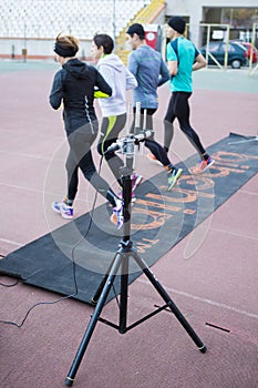 Runners passing a timekeeping checkpoint