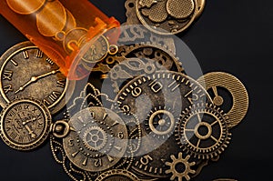 Time cures everything or time heals every pain concept with a bottle of prescription painkiller bottle and small metallic clock