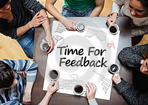 Time for feedback written on a poster with drawings of charts