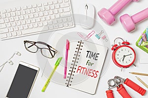 Time for Fitness active healthy lifestyle background concept. Flat lay of office workspace desk with keyboard and mouse, office