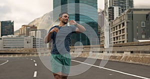 Time, fitness and a man running in the city for sports training, getting ready for a marathon or race. Watch, exercise