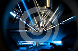 Time of flight mass spectrometer in closeup shot with blue light