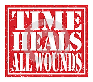 TIME HEALS ALL WOUNDS, text written on red stamp sign
