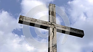 Time laps wooden cross with clouds