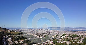 Time-lapse 5x San Francisco bay area skyline over the mountains on a clear blue sky