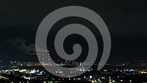 Time lapse apartment building at night.Night view of a neighbourhood with high-rise apartment blocks illuminated window