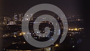 Time lapse of apartment building at night. Timelapse of residential flats windows lighting up and turning off overnight