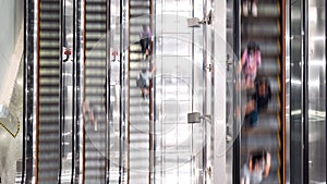Time-lapse of Asian people transport on escalator at subway underground station in Hong Kong