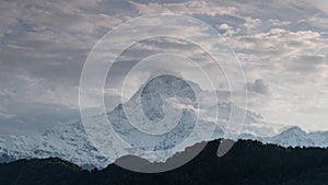 Time lapse of Beautiful Mountain View of Machapuchare peak or Fish tail peak at sunset, Annapurna range in Pokhara, Nepal, Asia