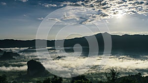 Time Lapse Beautiful Sunrise. Mist and Cloudscape Over The Mountain.