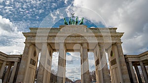 Time lapse. Brandenburg Gate or Brandenburger Tor in Berlin, Germany is a famous national landmark and tourist