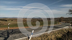 Time lapse of a car traffic on the field road around national park Harz in Germany.