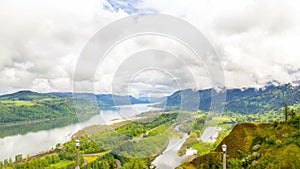 Time lapse of clouds over Columbia River Gorge with i84 auto traffic in Portland OR 4k