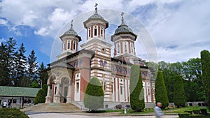 Time lapse of clouds over the Holy Trinity Church in Sinaia, Romania. Religion, sightseeing, landmark
