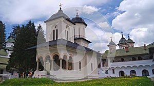 Time lapse of clouds over the old Monastery in Sinaia, Romania. Religion, sightseeing, landmark, Eastern Europe