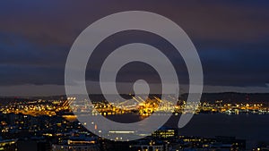 Time lapse of clouds over Port of Seattle along Puget Sound in WA state at dawn