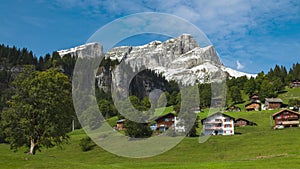 Time lapse of clouds passing mountains. Eggstock mountain peak, Eggstocke. Braunwald, Linthal, Canton of Glarus, Switzerland