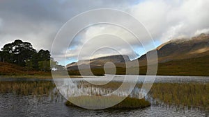 Time lapse clouds rolling over Torridon mountains