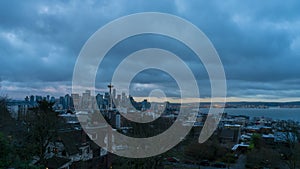 Time lapse of clouds and sky over Seattle WA at sunrise one early morning