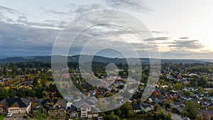 Time lapse of clouds and sunset over homes in Happy Valley Or early Fall Season