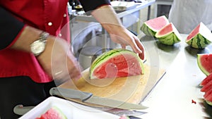 Time Lapse - The cook cuts a watermelon