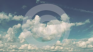 Time lapse cumulus, Cirrostratus and stratocumulus Sc clouds against blue sky. Cloudiness moves lower and faster