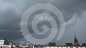 A time lapse of dark swirling low level nimbostratus, stratus and cumulus clouds