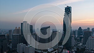 Time lapse day to night modern building in business area at Bangkok,Thailand