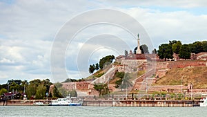 Time lapse of dramatic fast moving clouds over Belgrade fortress with Victor monument