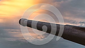 Time lapse of dramatic sky with Cannon barrel of a German bunker in Longues sur Mer, Normandy, France near Utah and Omaha