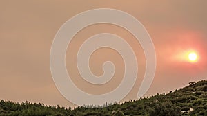 Time Lapse of Fire Smoke Clouds from Forest Fire at Sunset.